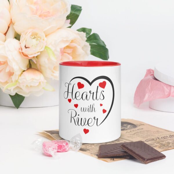 Hearts With River Logo - Mug with Red Inside — held in hand Hearts With River Logo - Mug with Red Inside — held in hand