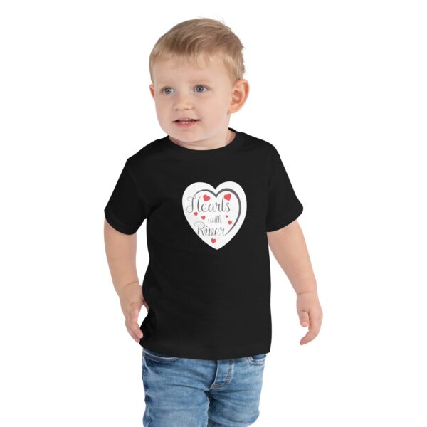 Hearts With River Logo - Toddler Short Sleeve T-shirt — worn by a model