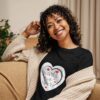 Hearts With River Logo - Women's Relaxed T-Shirt — worn by a model Hearts With River Logo - Women's Relaxed T-Shirt — worn by a model
