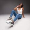Rebirth - Women’s High Top Canvas Shoes — worn by a model