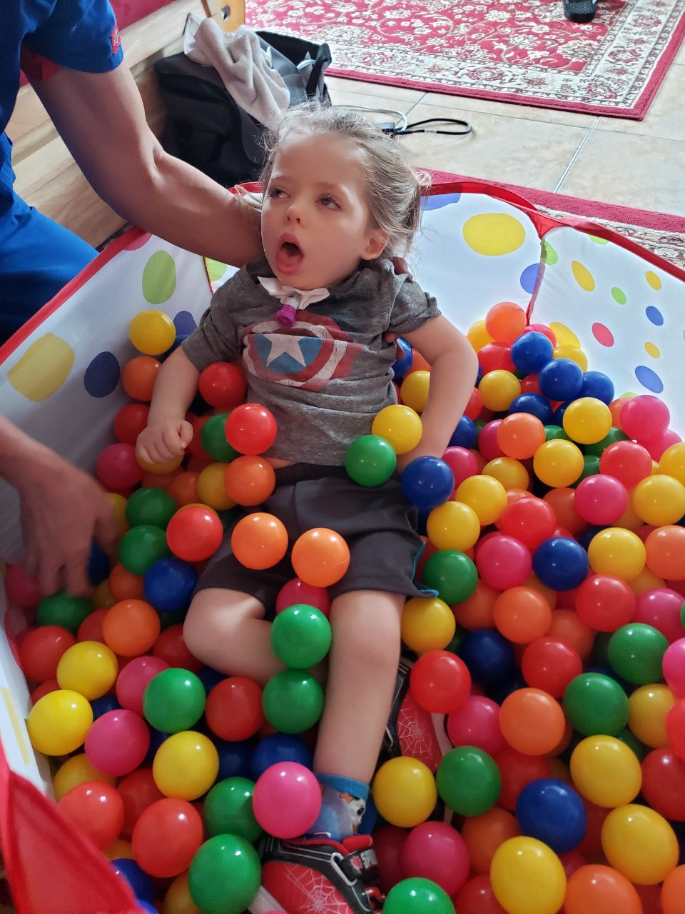 River having fun in the ball pit